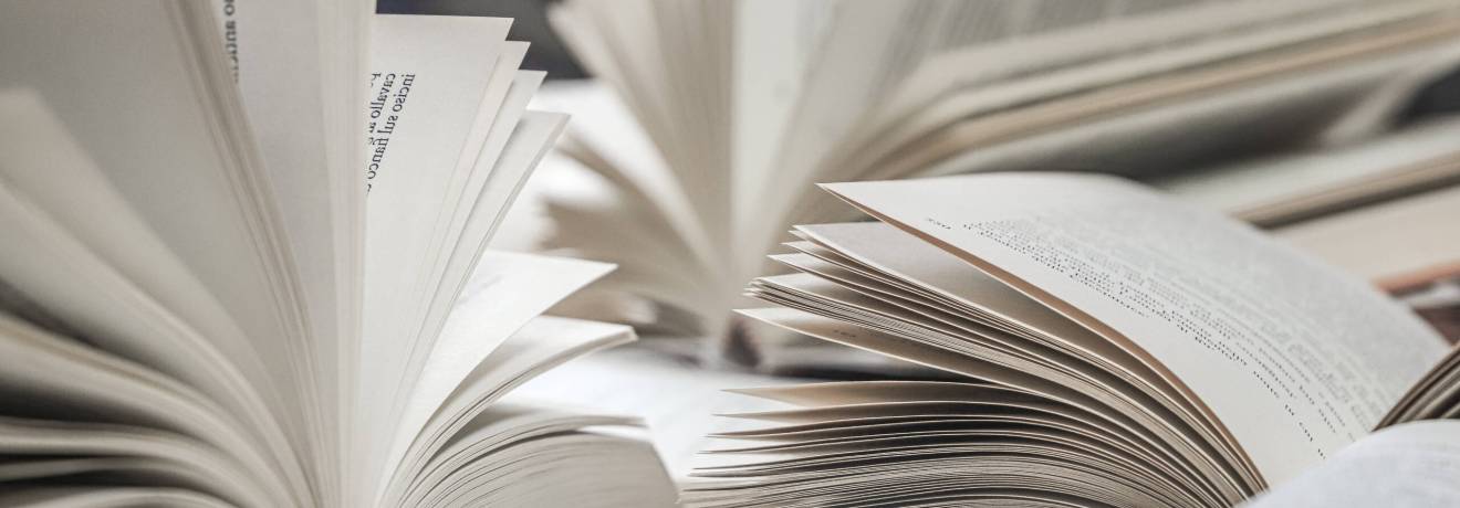 stack of books close up open book on the table i 2024 02 02 17 33 20 utc scaled
